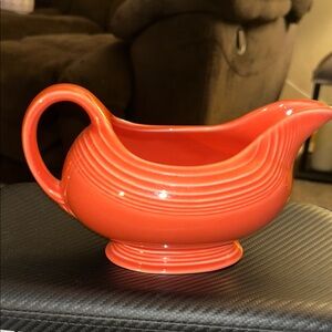 Vintage Homer Laughlin Fiestaware gravy boat in discontinued Persimmon color.